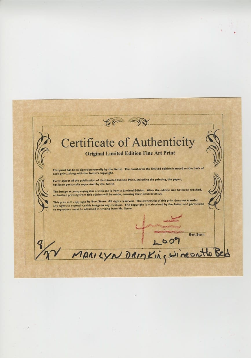 Bert Stern – Marilyn Monroe drinking wine on the bed