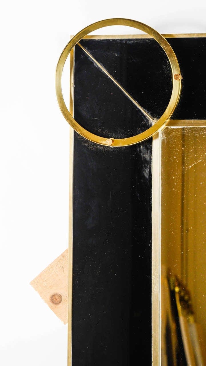 Miroir en verre noir et garniture laiton, 1985