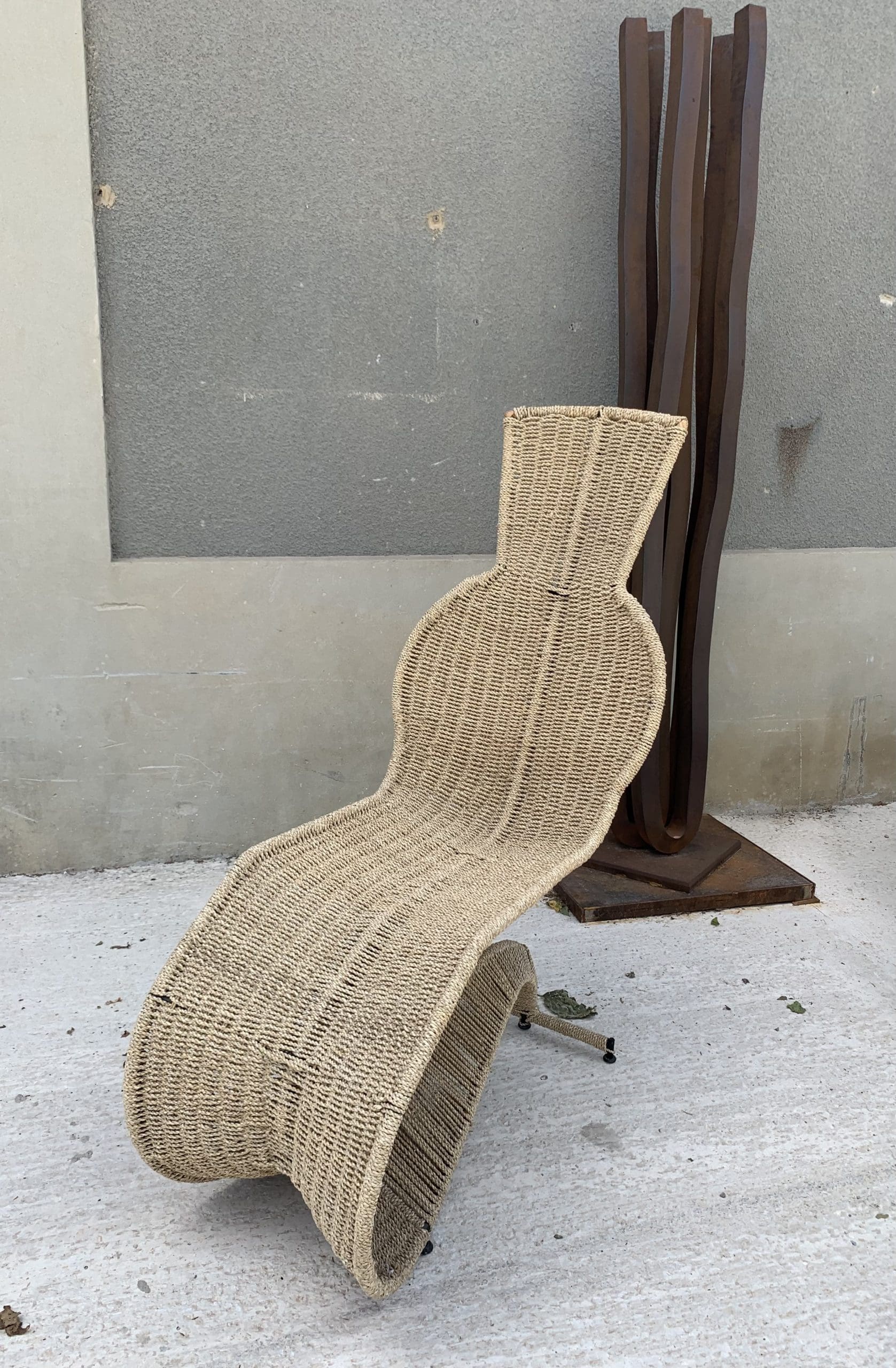 Speed-loungestoel in smeedijzer en rotan – Tom Dixon