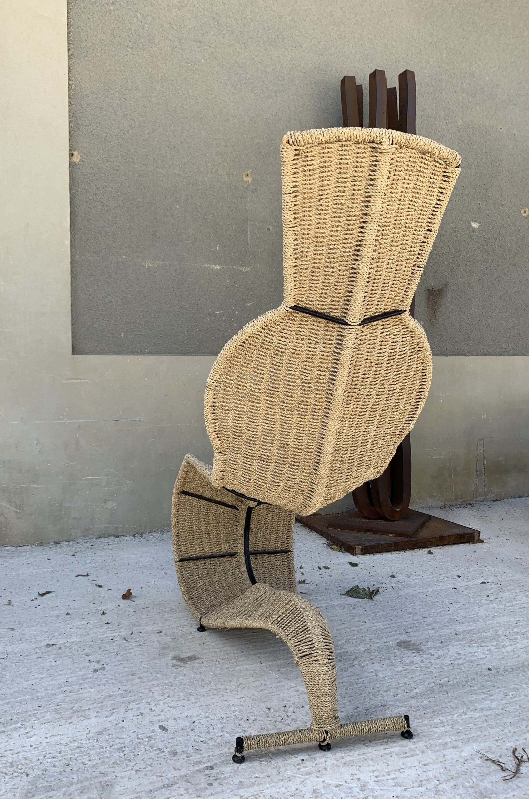 Speed-loungestoel in smeedijzer en rotan – Tom Dixon