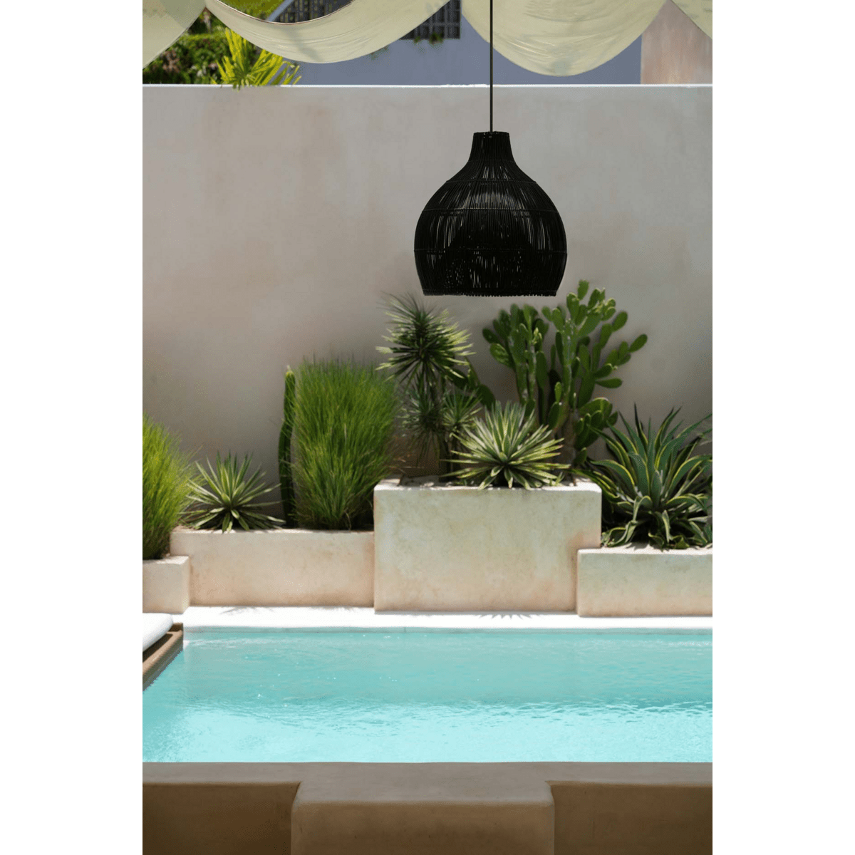 Suspension bohème chic en rotin noir – The Lobster Trap